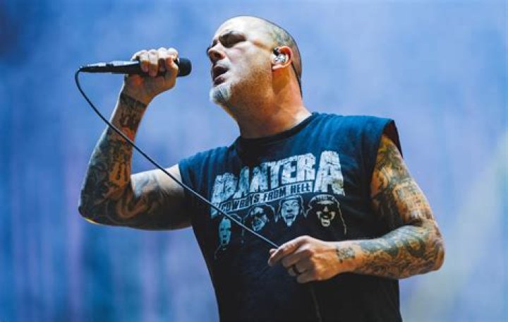 David Performs Pantera's "Walk" with Breaking Benjamin in Dallas - what songs does disturbed cover