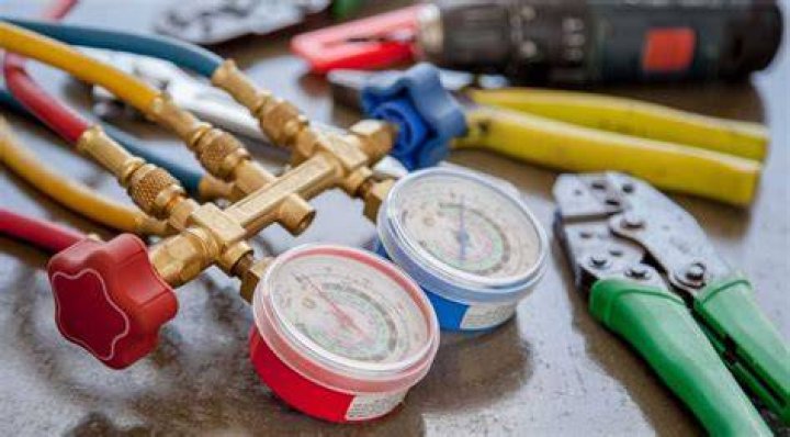 HVAC Technician with tools HVAC Technician with tools