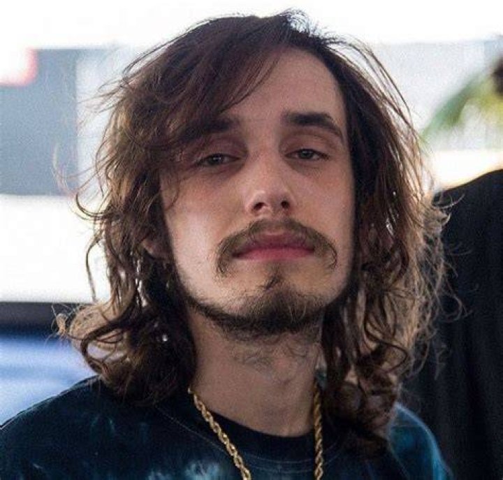 Pouya Phone Number
